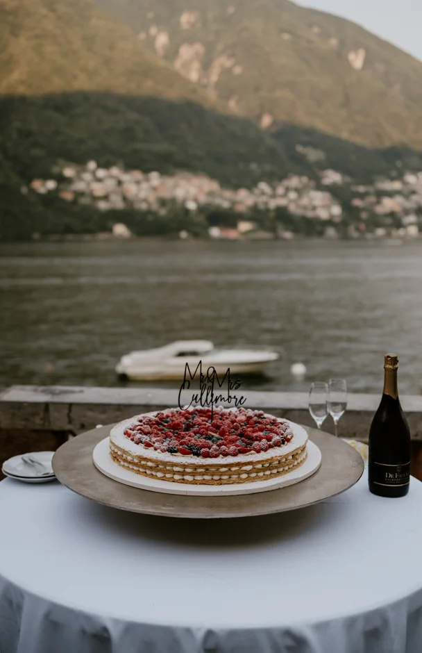 Wedding cake presented beside the lake
